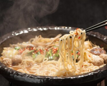 Filming of motsunabe (tripe hot pot) inside a restaurant in Kitakyushu motsunabe (tripe hot pot)